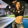 crop top negro dama con cierre con letras doradas dancer spirit frente 4